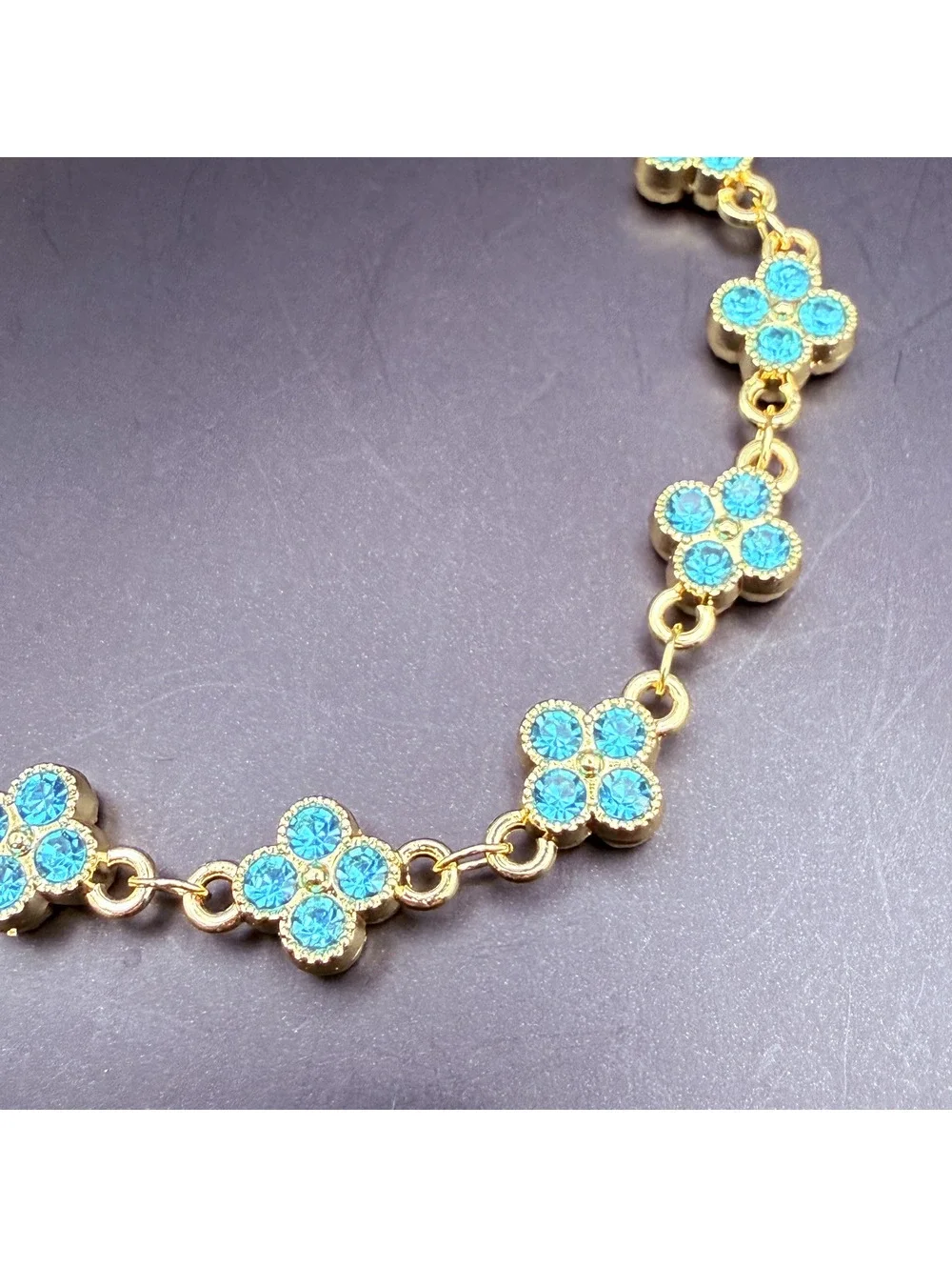 candy+clover aqua crystal clover gold tone bracelet